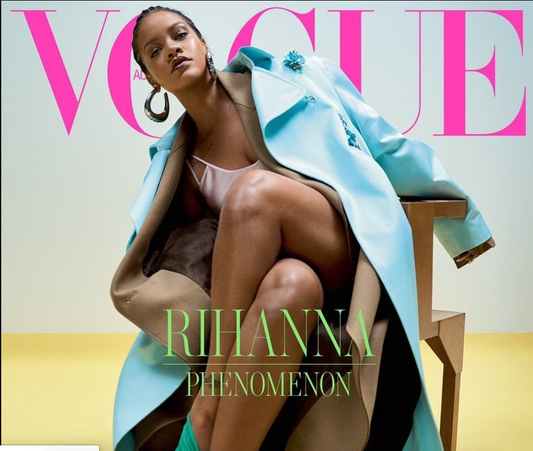 Rihanna poses for the new cover page of Vogue
